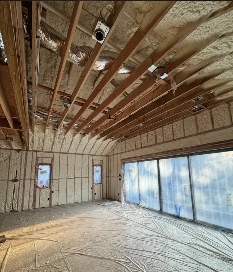 Interior walls and ceiling insulated with spray foam during new construction in Wenatchee